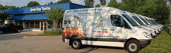 wide shot of Green Step Flooring vans